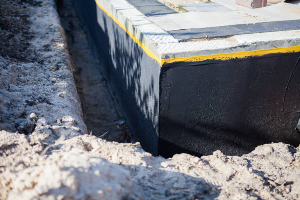 Professional Waterproofing technician working in Walbridge, OH